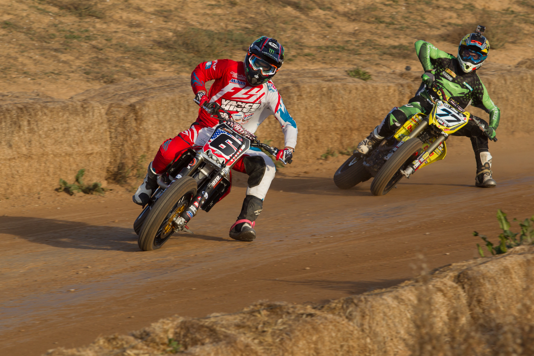 Baker (6) has some fun in the dirt with RFME Spanish Flat Track Champion Ferran Cardus (77). 